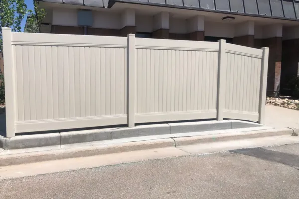 tan vinyl fence on concrete 