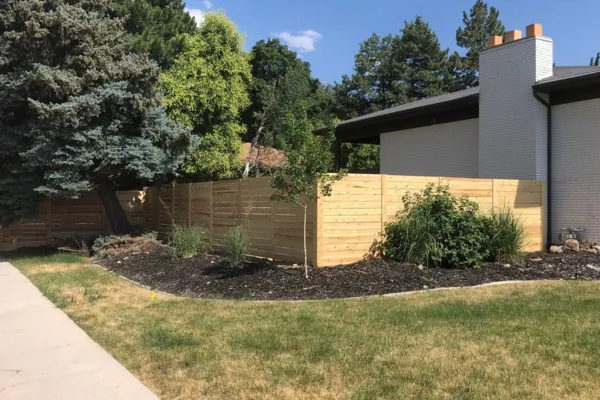 wood fence on the side on a house