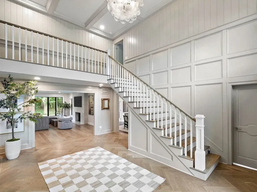 Remodeled bathroom in Landenberg PA with modern fixtures, natural light, and elegant tile flooring. Showcases high-end design.