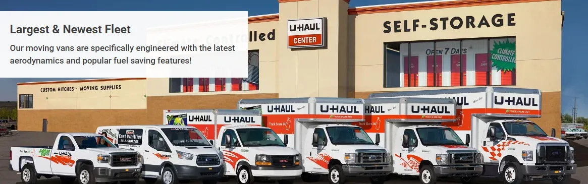 Lineup of U-Haul rental moving trucks in various sizes