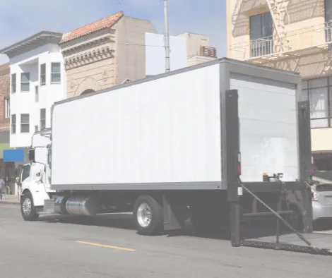 moving truck parked outside of a house