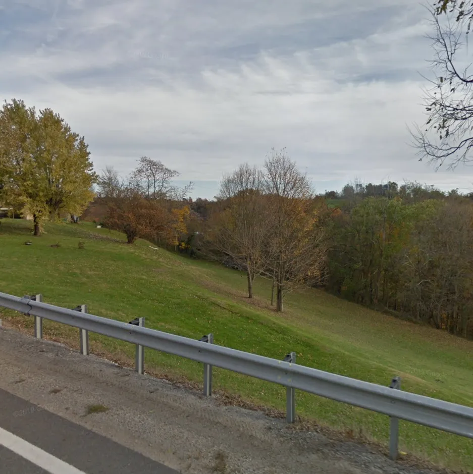 country road looking over fall trees