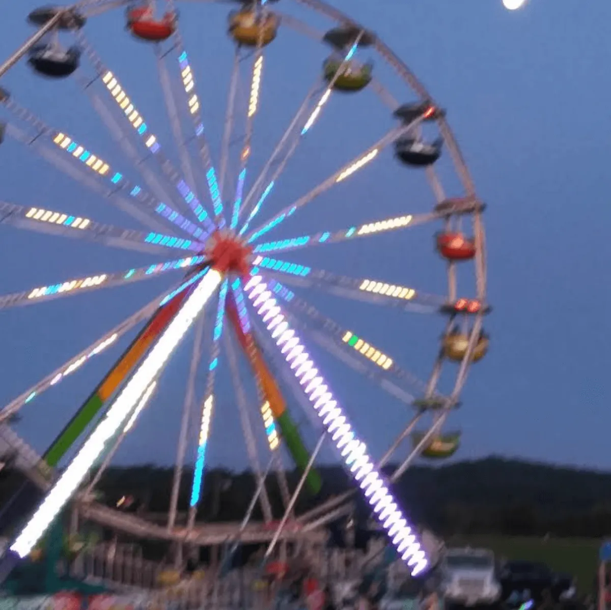 ferris wheel lit up at the west virginia inerstate fairgrounds in mineral wells