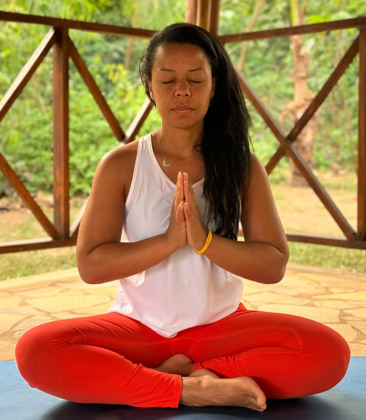 Natasha Fullerton in meditation pose