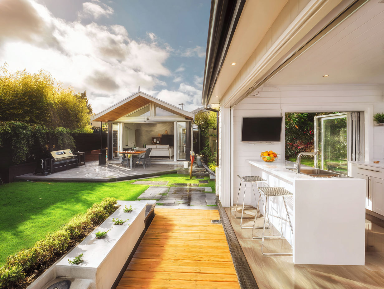 Modern landscaped garden in East Auckland with decking and planting