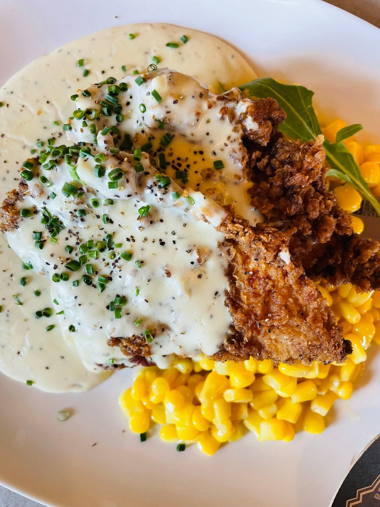 Chicken fried chicken with country gravy and butter corn at Black Cap Brewing Company in Red Lion, PA