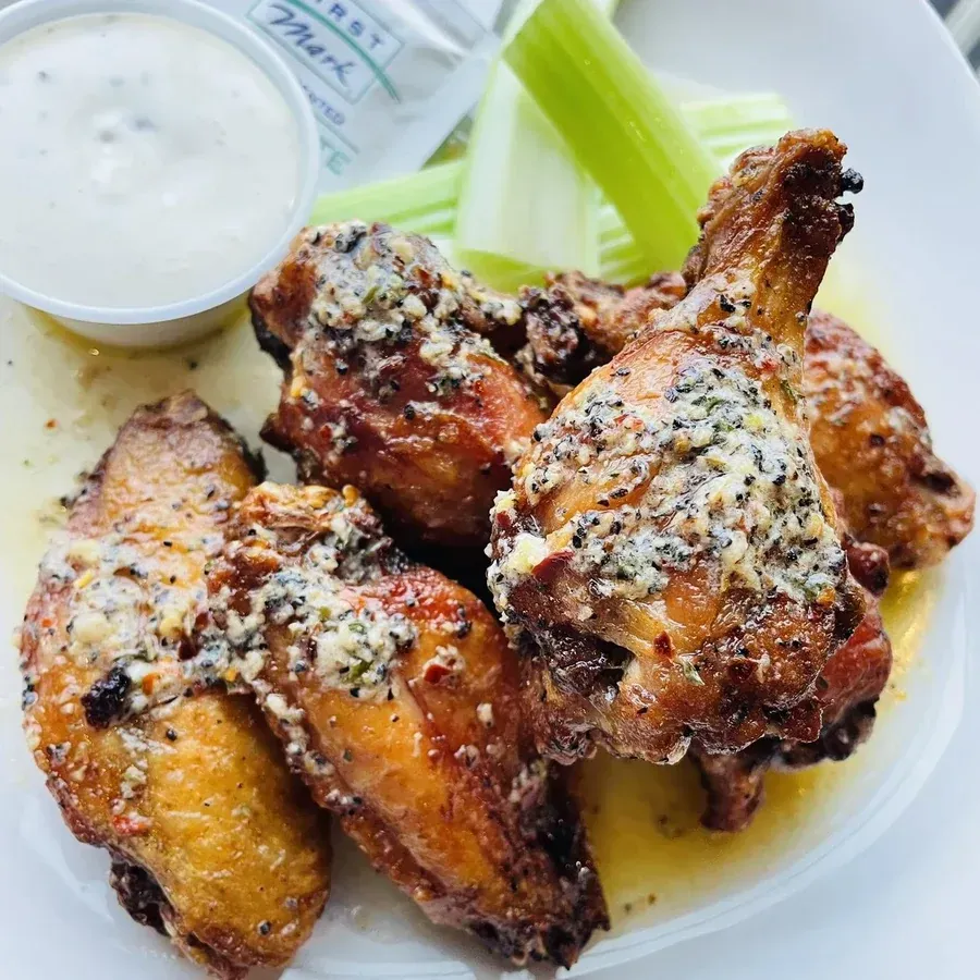 Garlic parmesan chicken wings with celery and dipping sauce at Black Cap Brewing Company in Red Lion, PA