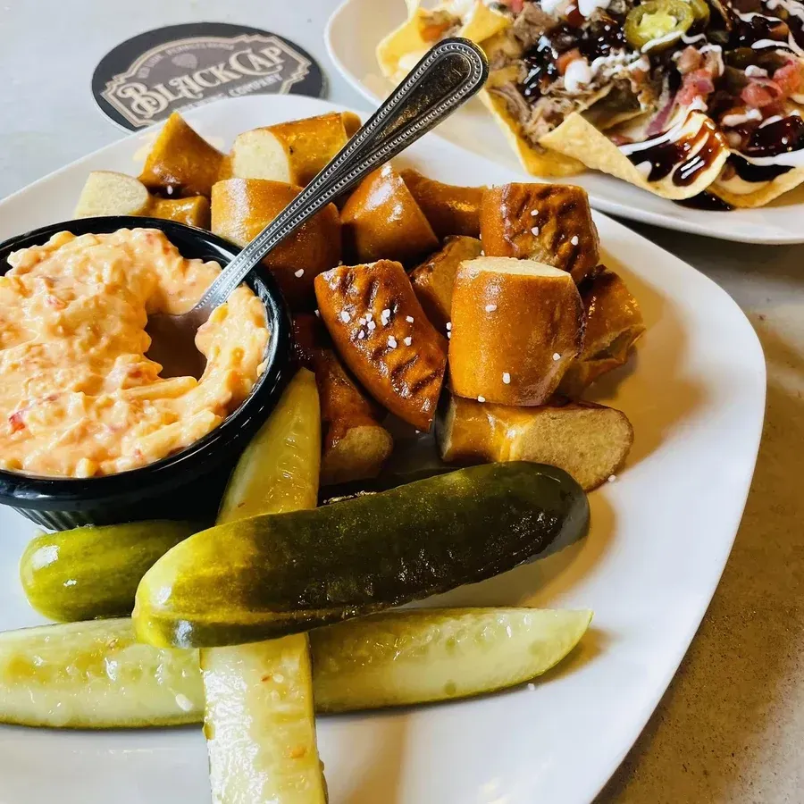 Pretzel bites and house pickles with pub cheese dip at Black Cap Brewing Company in Red Lion, PA