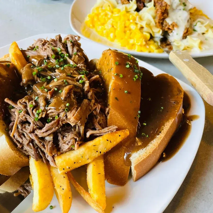 Open-faced brisket sandwich smothered in gravy with fries at Black Cap Brewing Company in Red Lion, PA