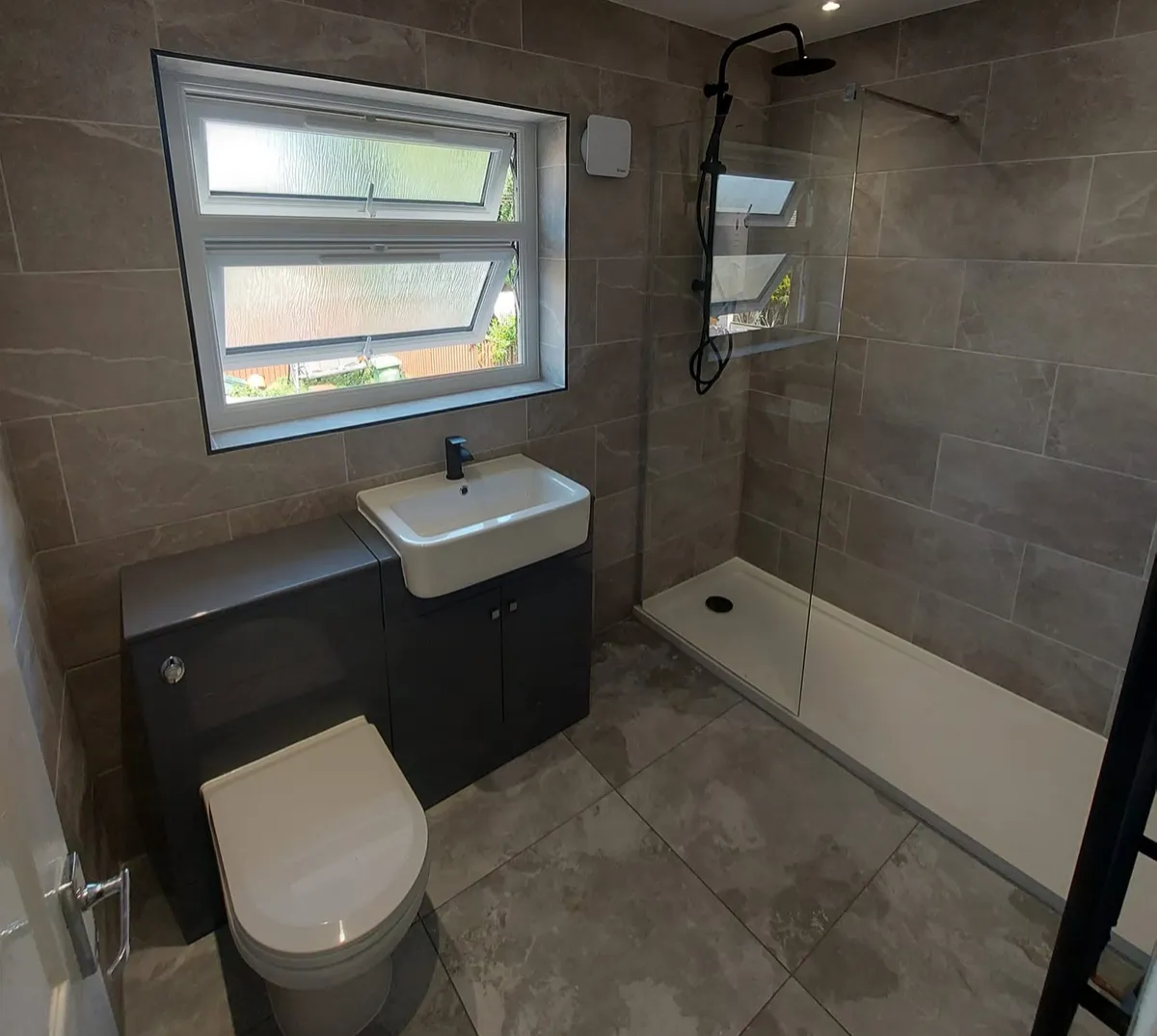 Bathroom remodeler in Staple Hill fitting a new bathroom suite