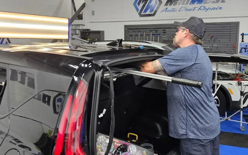 Repairing vehicle roof from hail damage