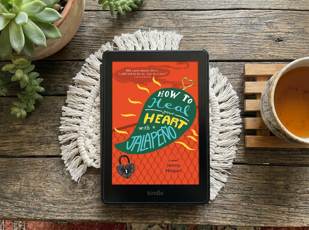 E-reader showing the cover of How to Heal Your Heart with a Jalapeño by Jenny Hogan