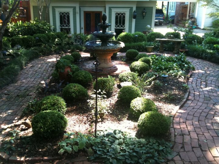 Recent landscaping work showing flower beds
