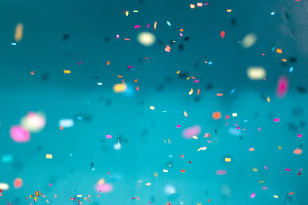 colorful confetti on a blue background