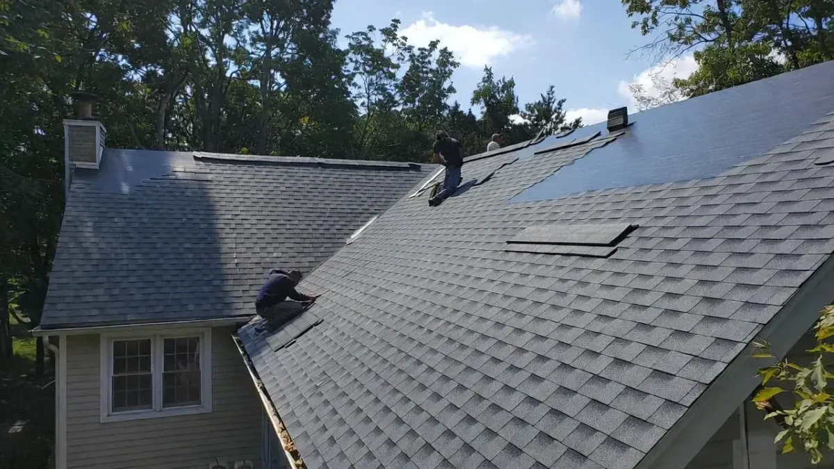 New asphalt shingle roof installation on a residential home in Everett, Massachusetts