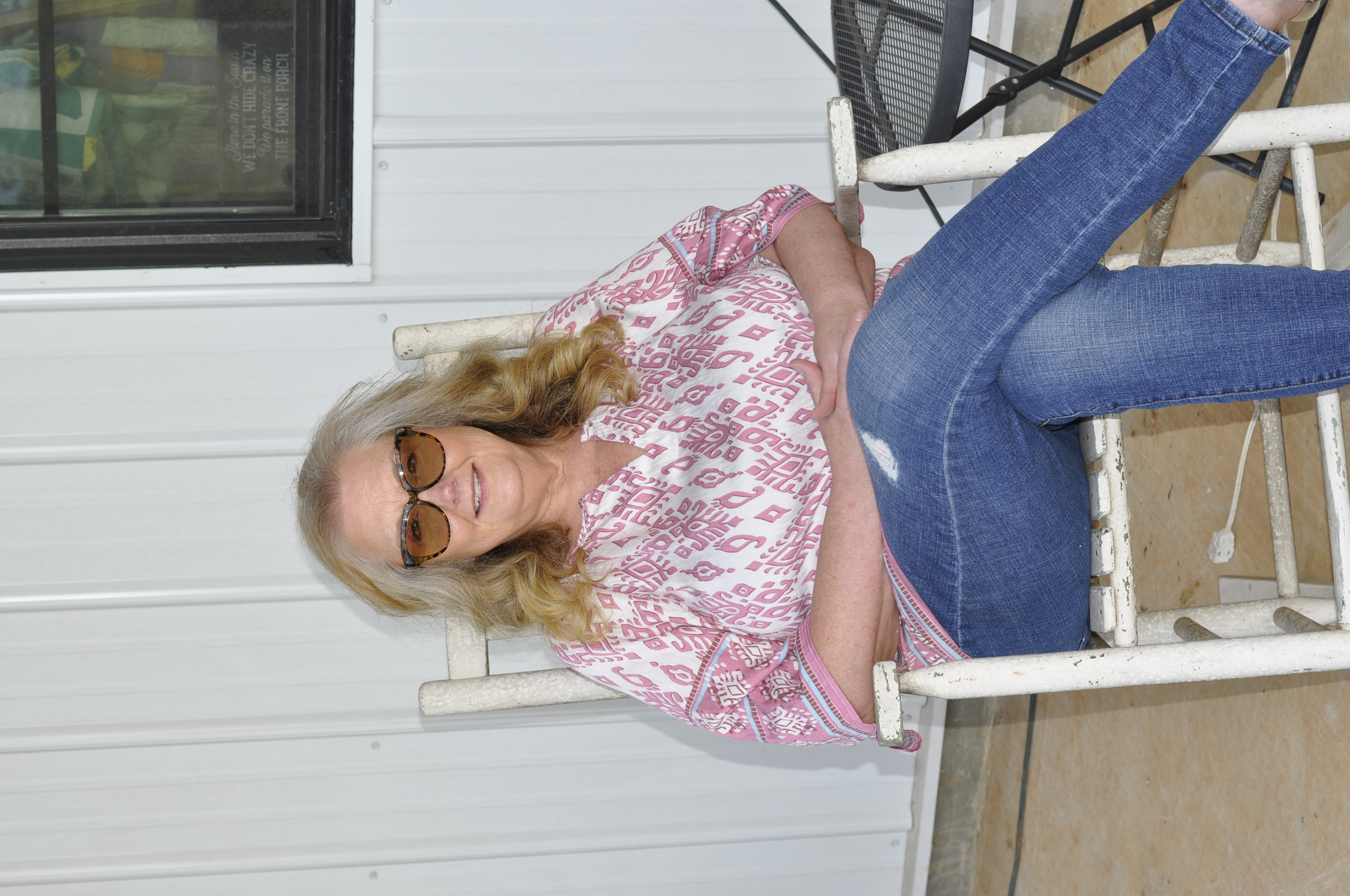 Robin in her sewing studio, crafting a memory quilt
