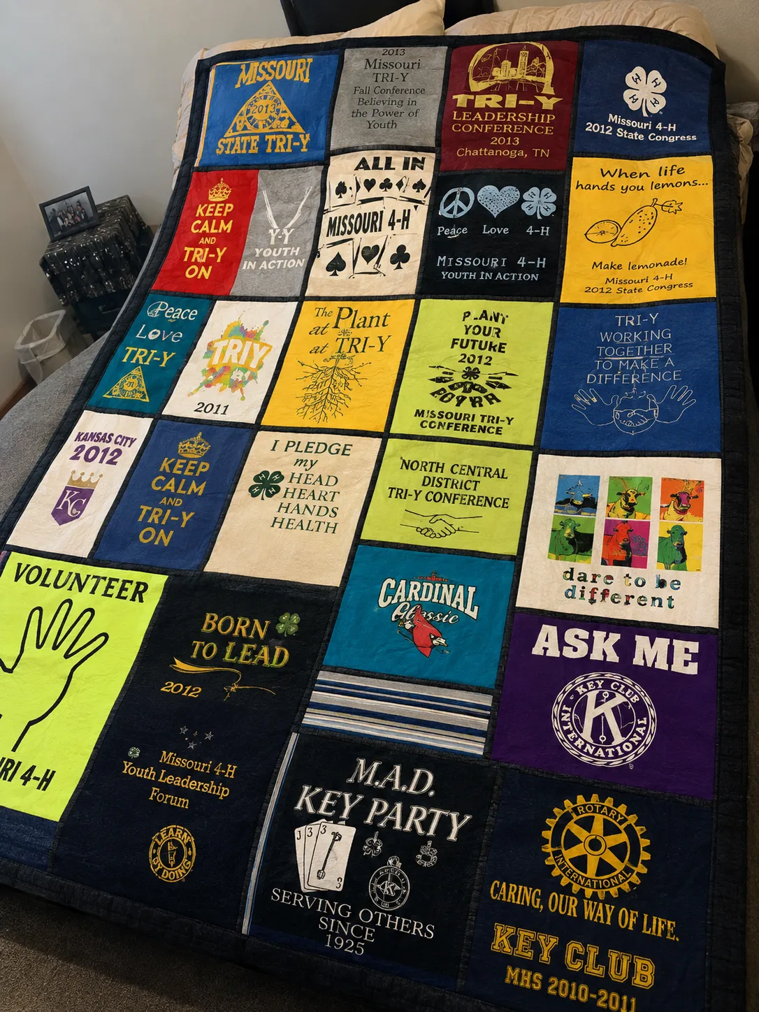Handcrafted memory quilt made from cherished family clothing