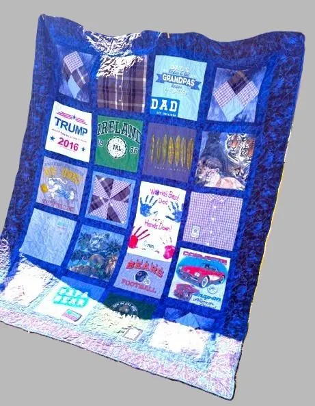 An intricate heritage quilt made of carefully preserved garments.