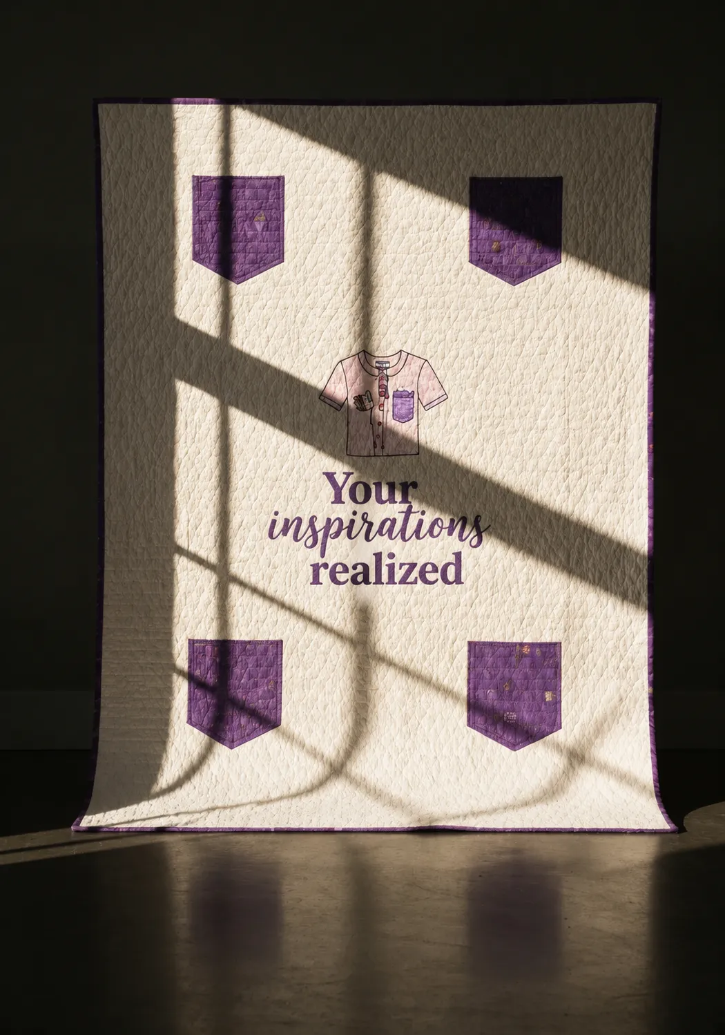 Robin Spanier hand-stitching a heritage memory quilt