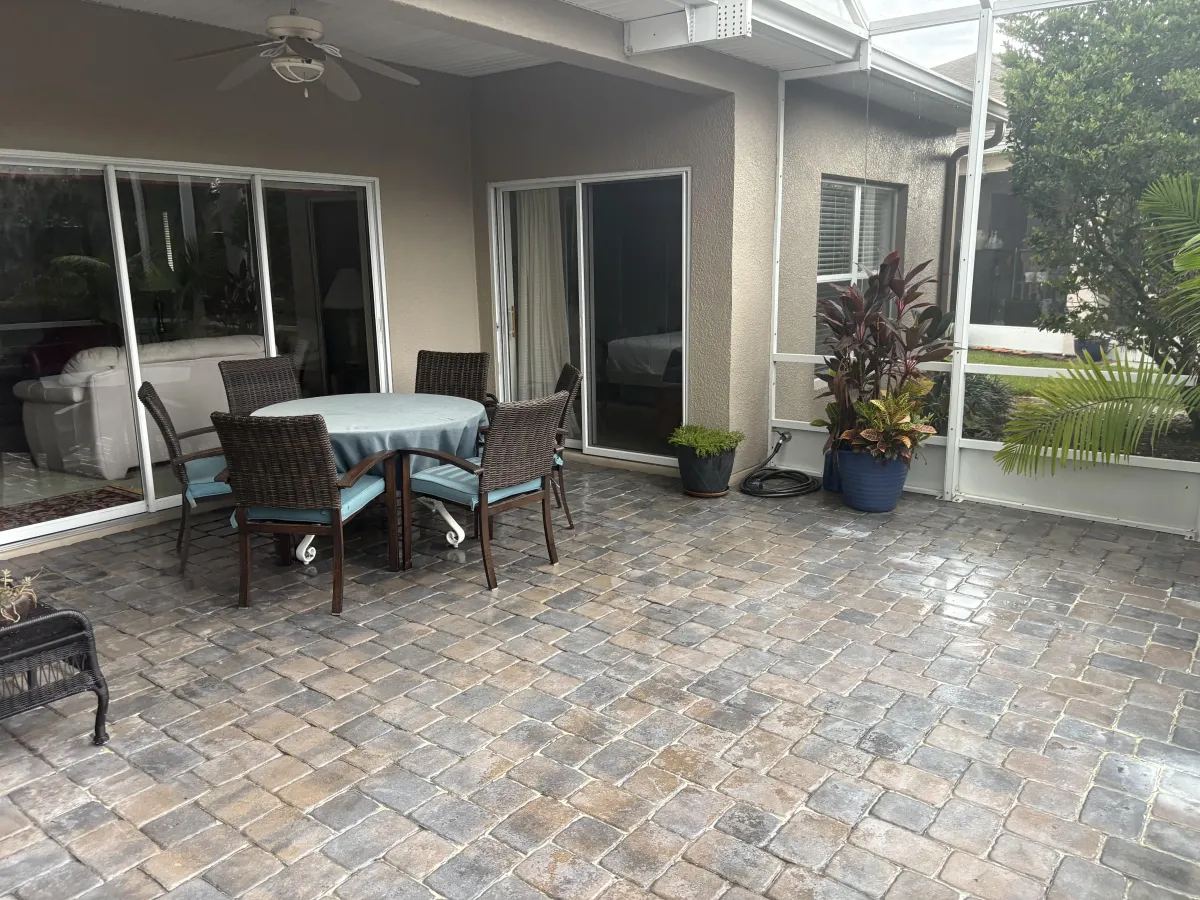 Residential roof washing service in Lakeland HOA community removing algae stains