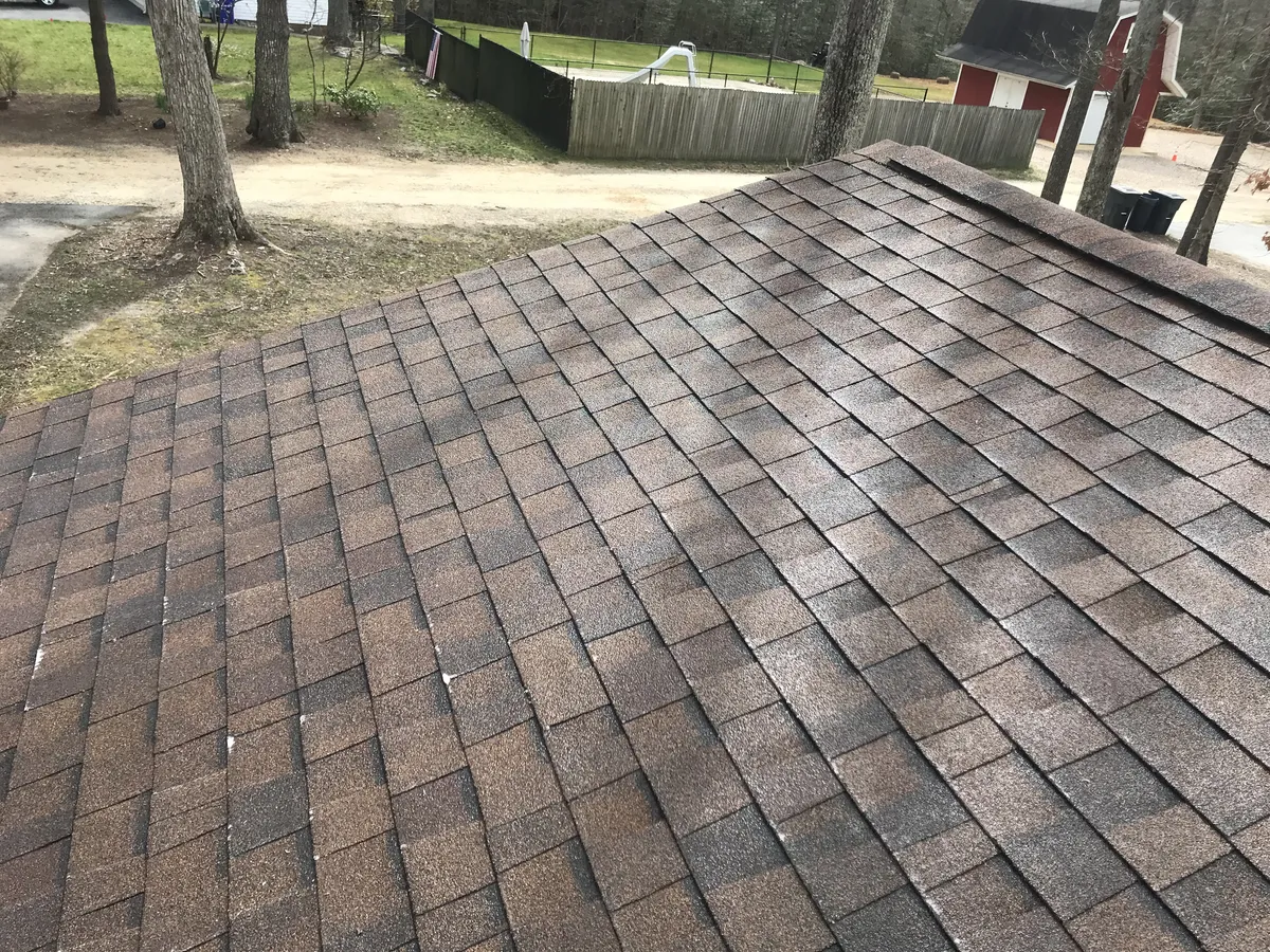Low-pressure soft wash equipment used for safe roof cleaning in Lakeland