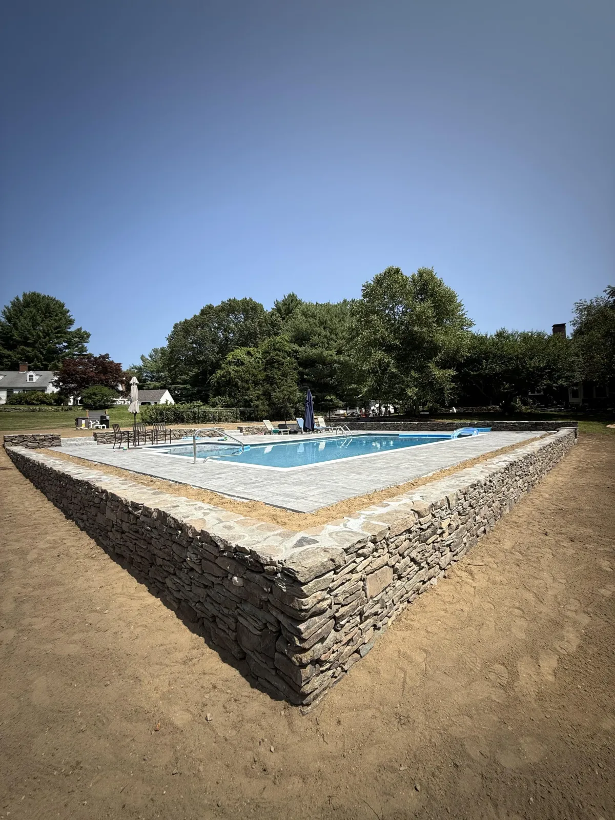 Masonry pool coping and structural bond beam detail