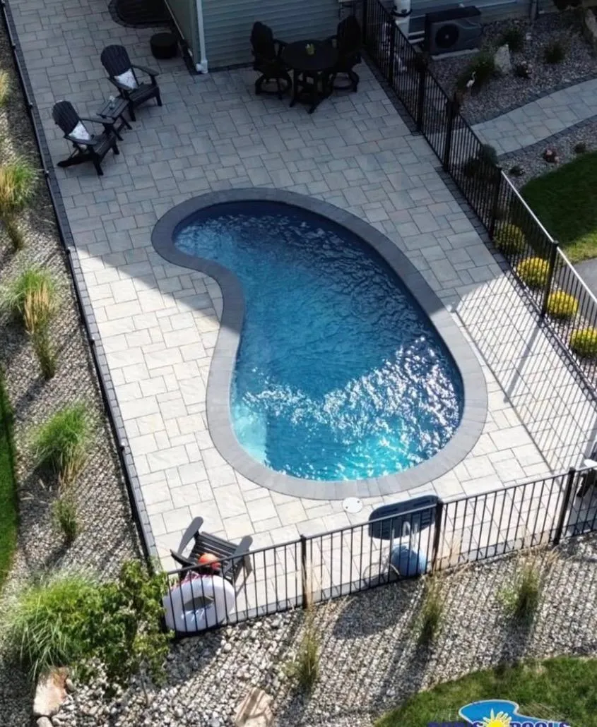 Detailed masonry flagstone work bordering a pool