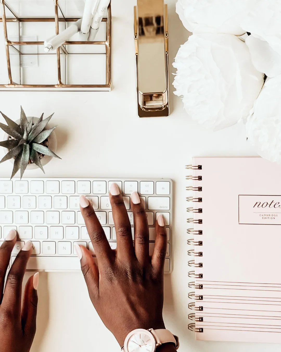 person writing on white paper