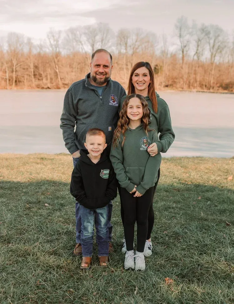 Aaron and Cassie Earls with their family, owners of Earl’s Lawn Service in Northern Kentucky
