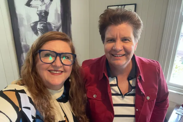 Reflective conversation over a cup of tea highlighting Bronwyn Evans’ experience in real estate, leadership, and community contribution, focusing on wisdom, integrity, and thoughtful business practice.