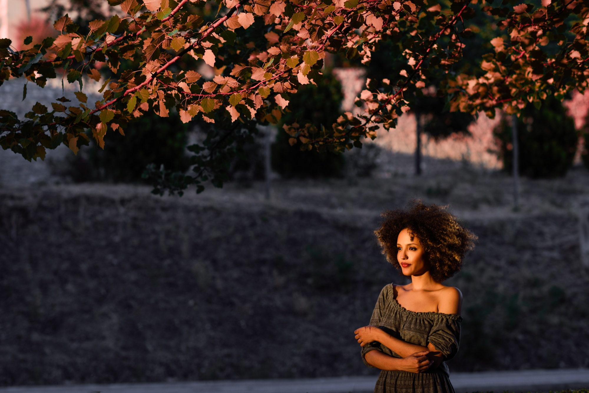 Successful woman reflecting with confidence on the progress and growth of her life journey.