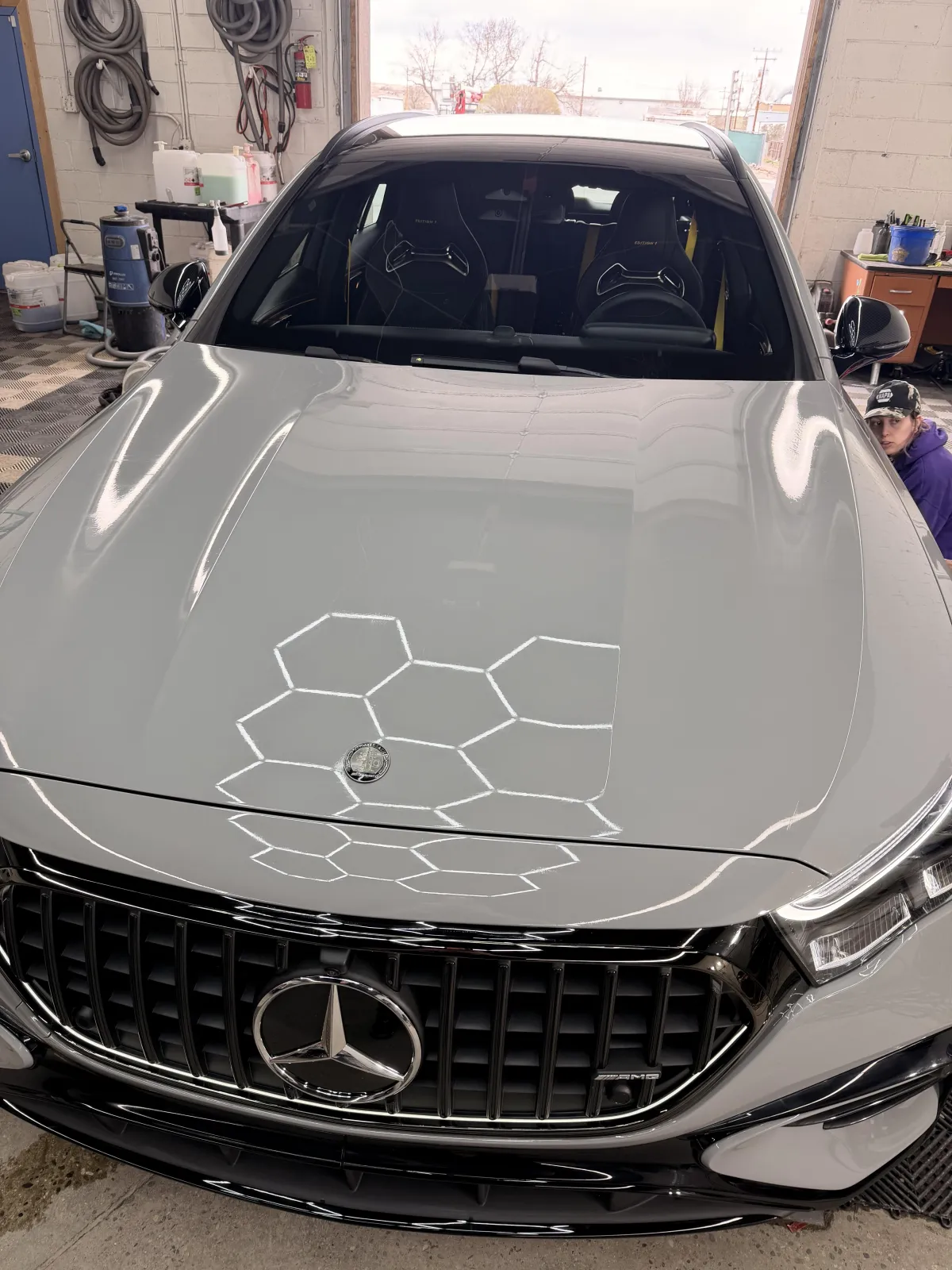 Mercedes-Benz vehicle showcasing a high-gloss finish under showroom lighting, emphasizing paint protection and detailing services at VIVE Auto Styling in Casper, WY.