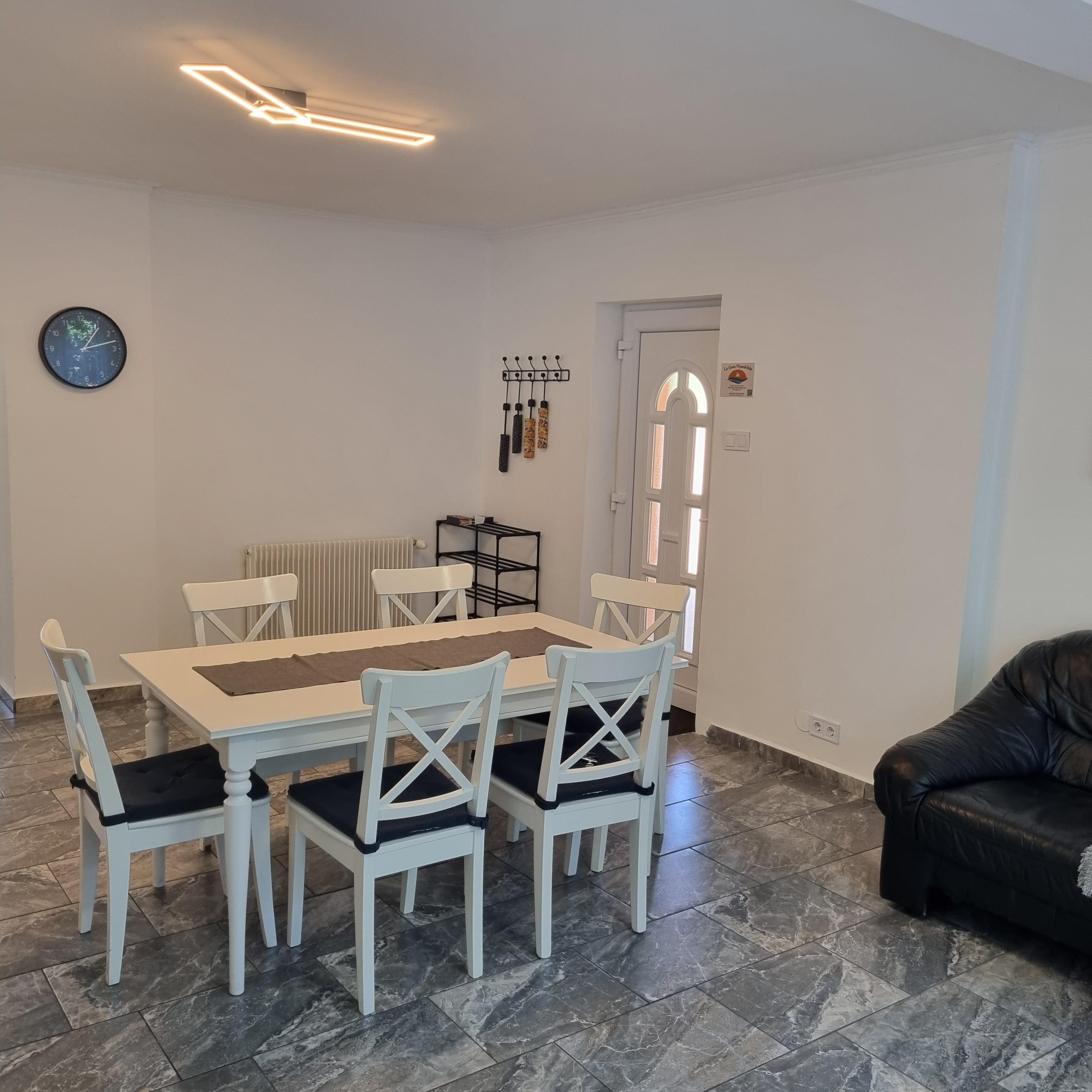 two gray sofas beside pool in room