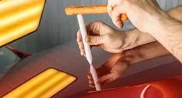 correção com martelinho de ouro