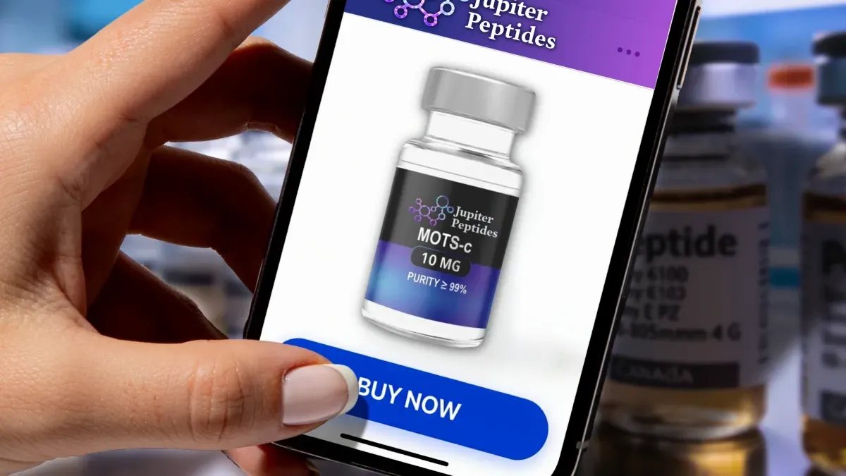 A hand holding a smartphone displaying a peptide product with buy option.