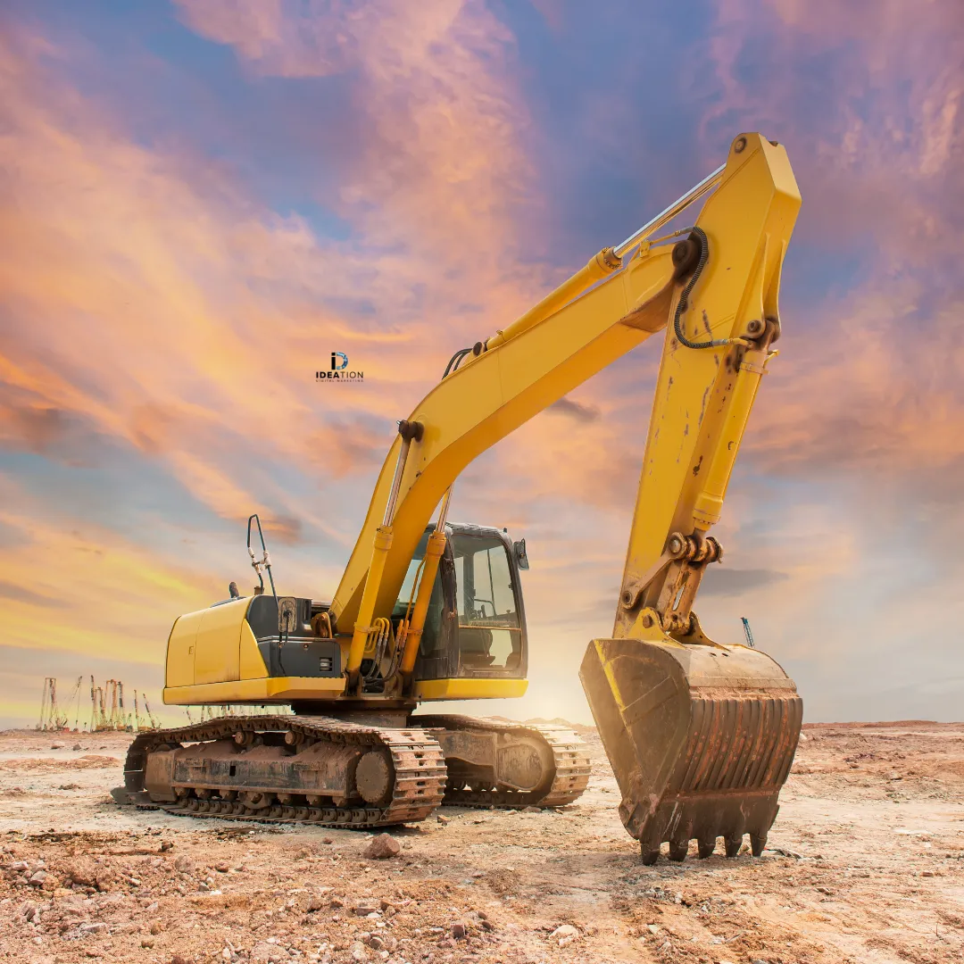 Completed commercial site by RidgeForge Construction with utility trenches and finished asphalt area at golden hour.