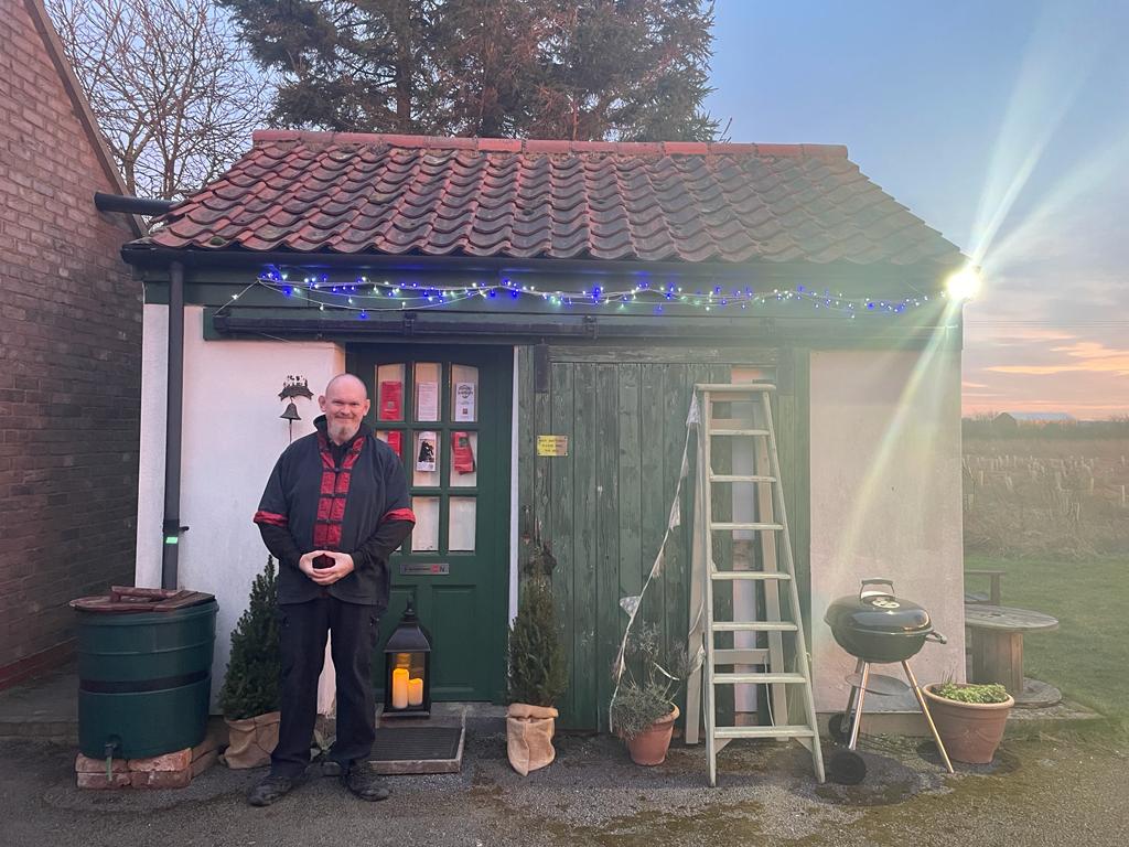 person doing yoga on floor