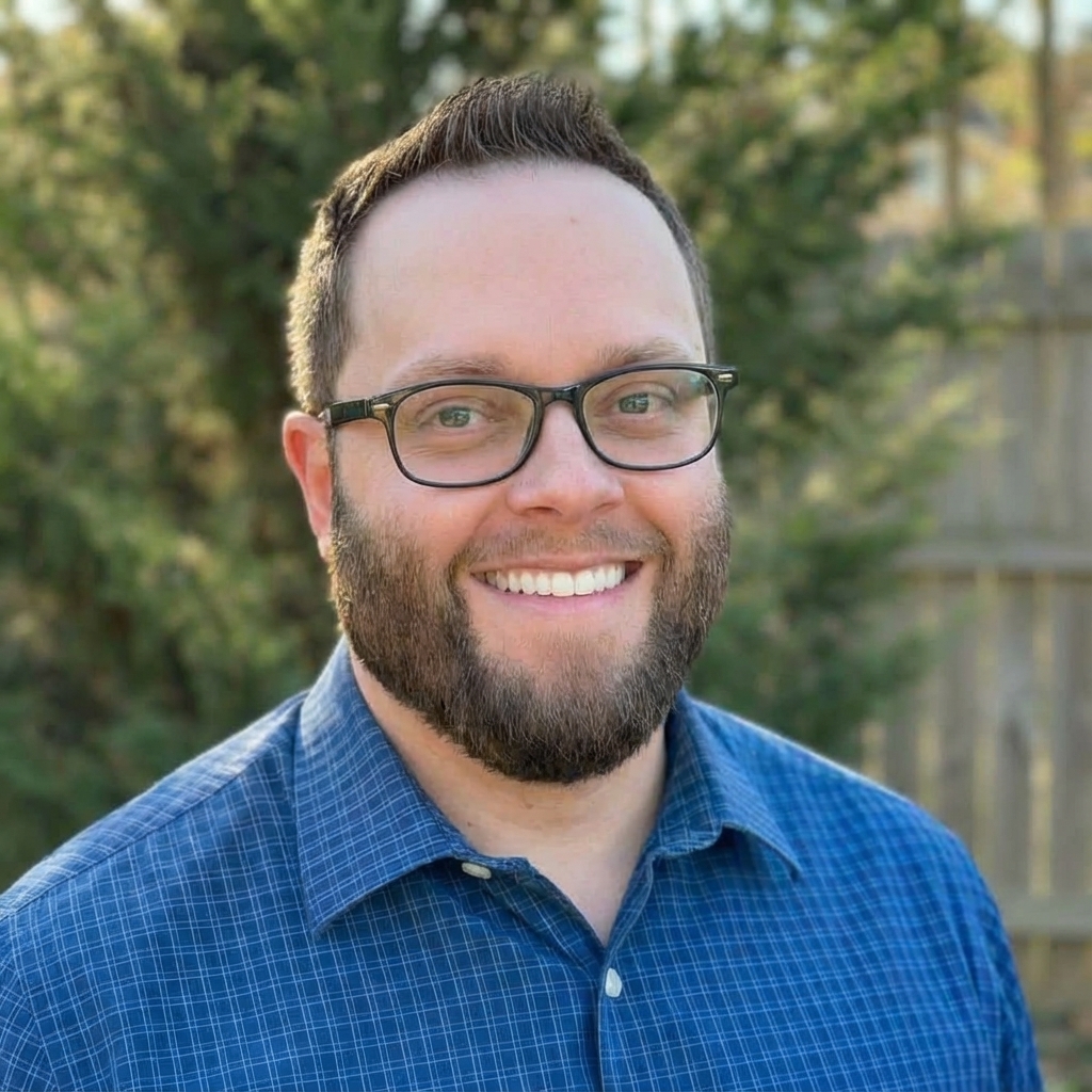 Professional man with beard and glasses