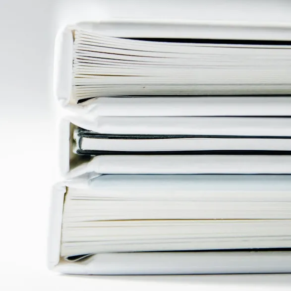 Close up stack of books and papers