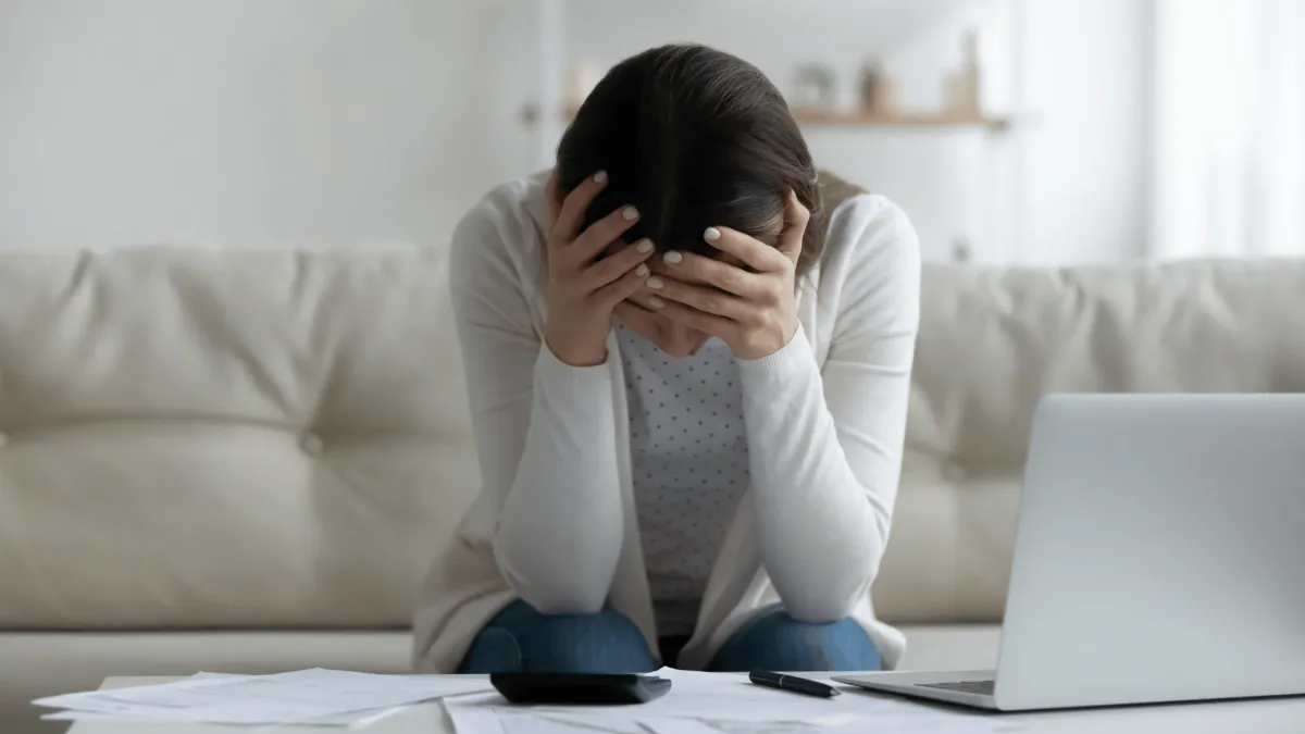 someone distraught about losing money
