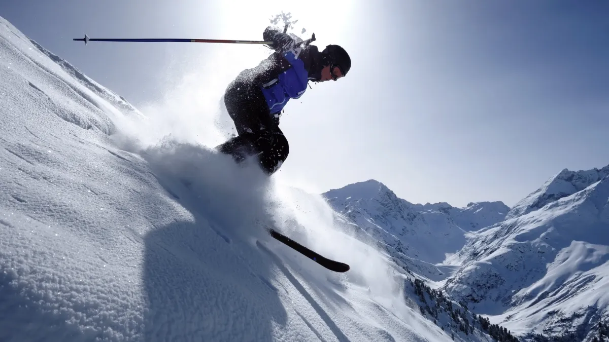 skiing down a mountain