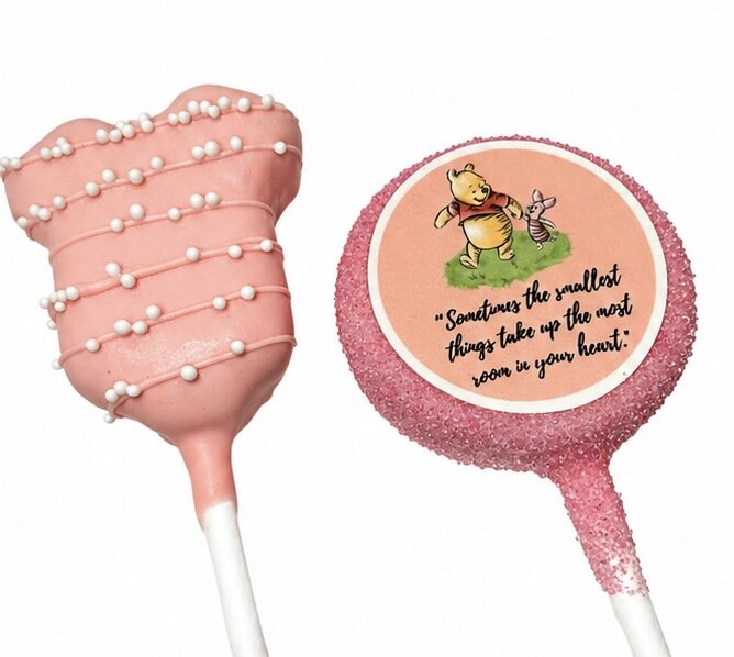 Pink baby shower cake pops with edible pearl detailing and a heartfelt quote, by Sugar Coast Sweets