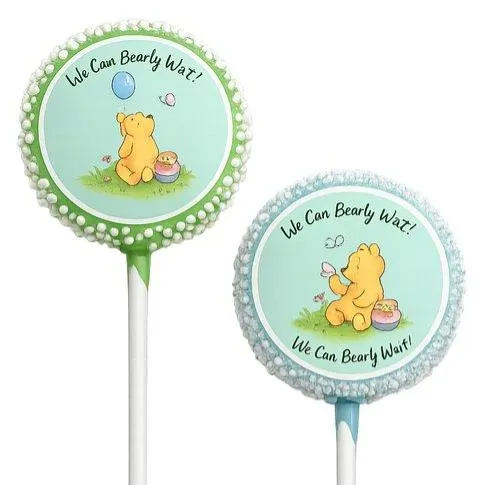 Bear-themed 'We Can Bearly Wait' baby shower cake pops with a honey pot design, by Sugar Coast Sweets