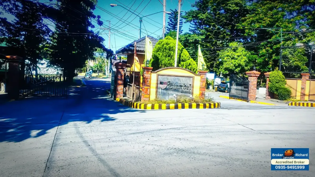 Main entrance gate to The Lake at St. Charbel in Dasmariñas, Cavite, welcoming residents into a secure and tranquil lakeside community.