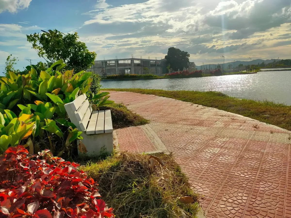 The Lake at St. Charbel features a scenic lake and a vibrant park, offering fun and relaxation for residents.