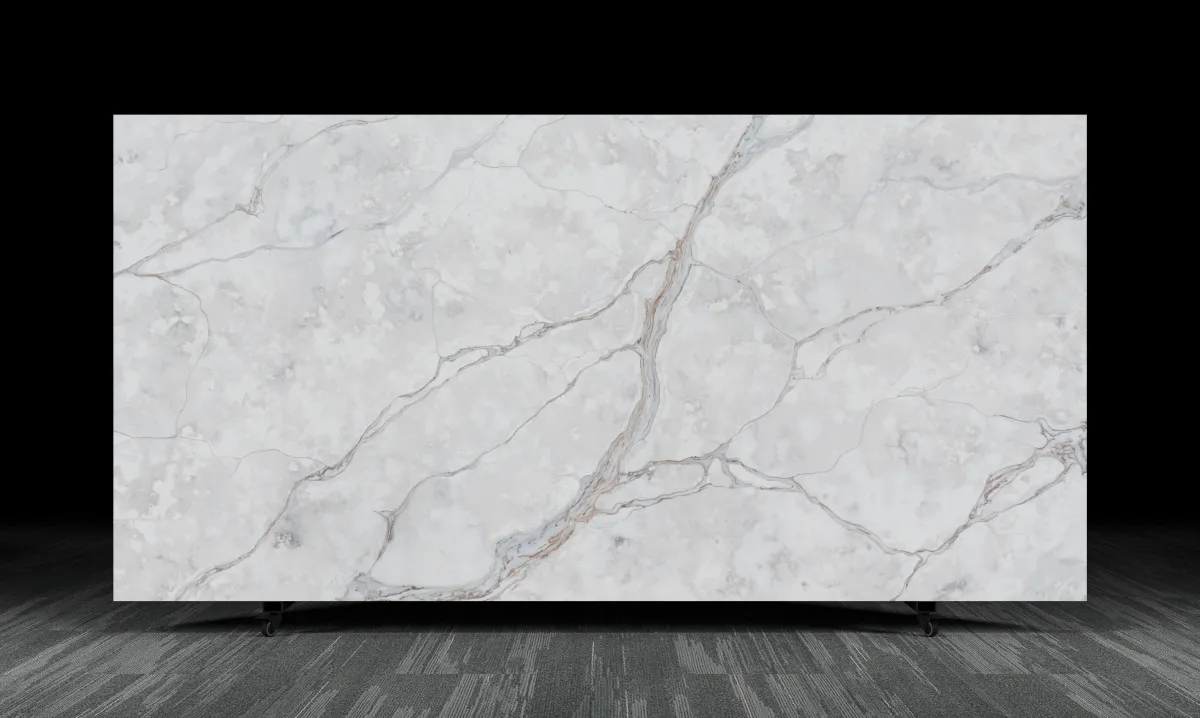 Polished grey stone slab with deep brown veining and smoky undertones, showcasing the Stonebark Counter Surface’s natural, earthy, and textured marble finish.