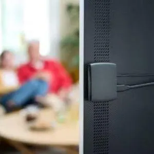 ReSound TV streamer on the back of a TV