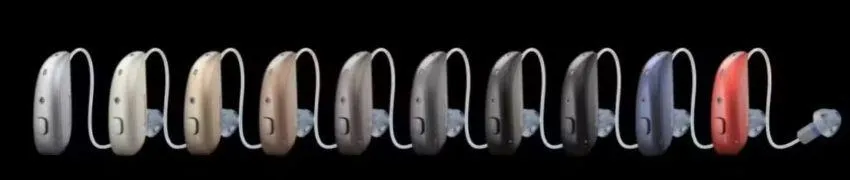 many resound hearing aids in different colors in a row
