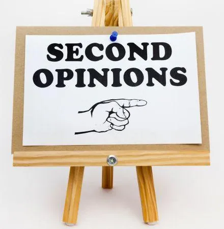 A sign Displayng the words "Second Opinions"