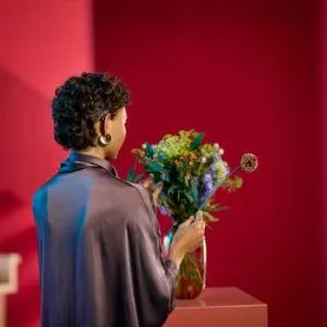 woman holding flowers